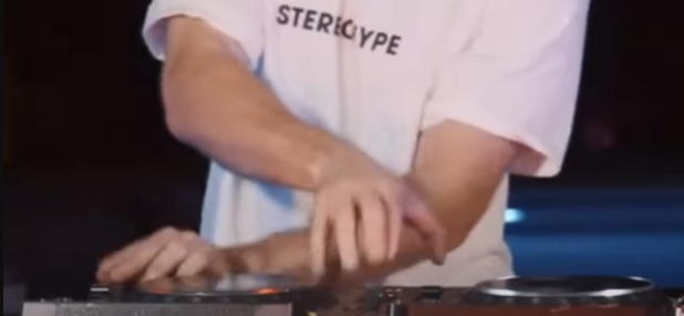 a dj using the cue drumming technique 